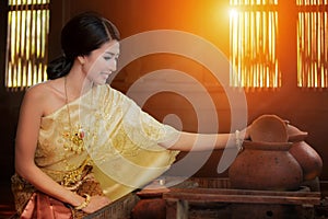 Thai lady cooking with original Thai style