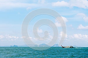 Thai longtail fishing boat in Andaman sea near Koh Lanta island, Krabi, Thailand
