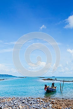 Thai Longtail Fishing Boat at Koh Tean near Samui island in summer day with blue sky