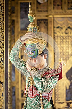 Thai man is dressed as the Ravana`s character. To prepare for the pantomime performance