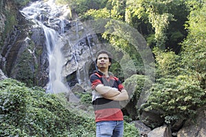 Thai man with Mae Tia Waterfall, Obluang National Park