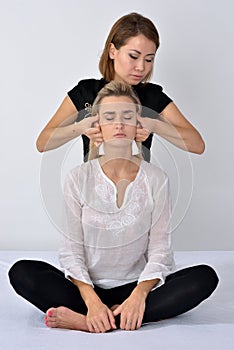 Thai Massage. Massage therapist working with woman