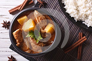 Thai massaman curry with chicken and rice closeup. horizontal to photo