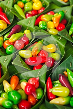 Thai Massapa`es ,Look Choup, Colorful deletable imitation fruits in banana leave container