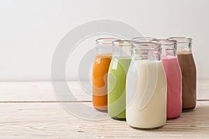 Thai milk tea, matcha green tea latte, coffee, chocolate milk, pink milk and fresh milk in bottle