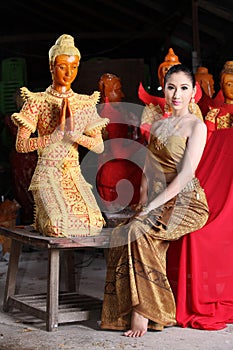 Thai model and wax statue