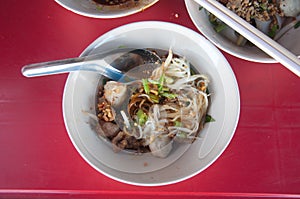 Thai noodle soup (Kuay Tiew Ruer) photo