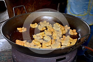 Thai people cooking deep-fried doughstick or Youtiao