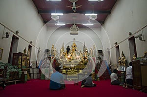 Thai people respect praying and gild cover with gold leaf on Luang Pho Ban Laem