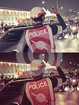 Thai police is working in the night in crowded of Bangkok