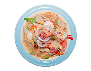 Thai pork sausage salad.shrimp, carrots, red peppers, onions, squid, in the plate isolated white background.