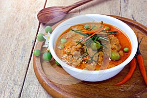 Thai red curry fried with pork and coconut milk (panaeng)