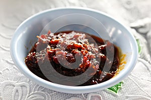 Thai Red Curry Paste in white dish