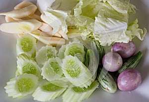Thai`s vegetable side dish set Yardlong bean,Eggplant chopped in bowl. set of Thai local herb vegetables salad dish.