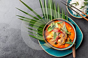 THAI SHRIMPS RED CURRY. Thailand Thai tradition red curry soup with shrimps prawns and coconut milk. Panaeng Curry in