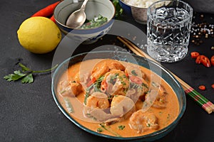 Thai shrimps red curry. Thailand tradition red curry soup with shrimps prawns and coconut milk.