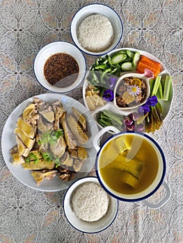 Thai Southern food, local food soups steam rice yellow chicken fish