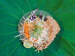 Thai Southern Rice Salad with Herb Vegetables on Lotus leaf with selective focus