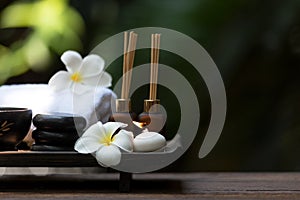 Thai spa composition treatments aroma therapy with candles and Plumeria flowers