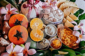 Thai spa ingredients with herbs and fresh tropical fruits