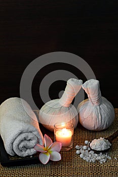 Thai spa massage setting on candlelight