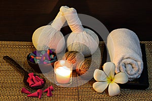 Thai spa massage setting on candlelight