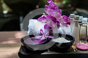 Thai Spa Treatments aroma therapy salt and sugar scrub and rock massage with orchid flower. Healthy Concept.
