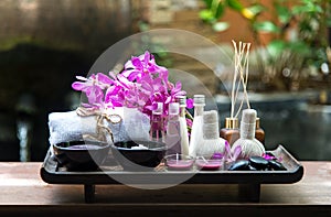 Thai Spa Treatments aroma therapy salt and sugar scrub and rock massage with orchid flower. Healthy Concept