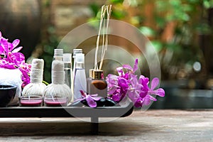 Thai Spa Treatments aroma therapy salt and sugar scrub and rock massage with orchid flower on wooden white. Healthy Concept. cop