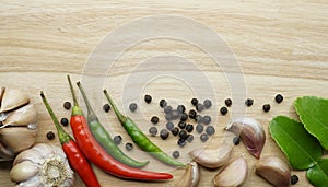 Thai spices ingredients on wooden table, Culinary concept background for recipe menu with copy space, Table top view.