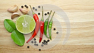 Thai spices ingredients on wooden table, Culinary concept background for recipe menu with copy space, Table top view.