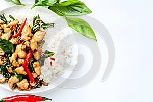 Thai spicy basil chicken with rice, white background and top space for menu title