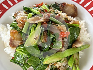 thai spicy fried crispy pork with vegetables