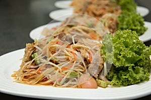 Thai Spicy papaya salad on plate