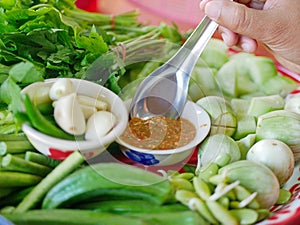 Thai spicy shrimp paste dip  Nam Prik Kapi  with variety of fresh vegetables