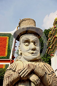 Thai statue with a hat
