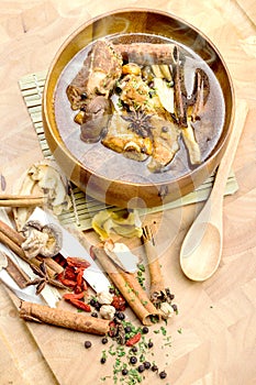 Thai stew of pork and herbal soup,