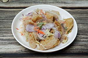 Thai street food, Spicy salad with fish meatball