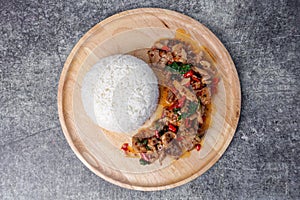 Thai street food, stir-fried pork with basil and rice