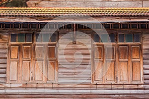 Thai style antique windows in Wat Rat Bamrung Wat Ngon Kai - Samut Sakhon, Thailand