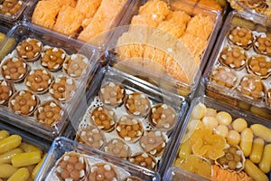Thai style desserts in plastic boxes