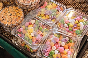 Thai style desserts in plastic boxes