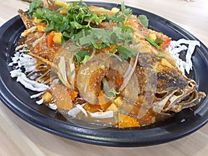 Thai style fried seabass in sweet and sour sauce