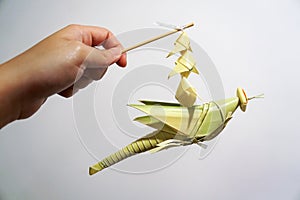 Thai style palm leaf grasshopper mobile handicraft