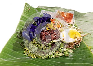 Thai style riceberry salad on banana leaves