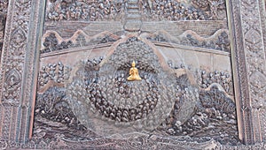 Thai style silver carving art on temple wall. Wat Srisupan, Chiangmai, Thailand.