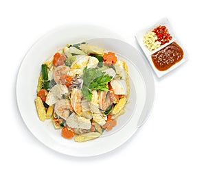 Thai Sukiyaki Stir Fried with Seafood Shrimps,Squids,Egg and Vegetables Carved Carrots flowers shape served Sauce