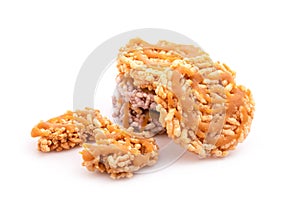 Thai Sweet Crispy Rice Cakes with Cane Sugar Drizzle isolated on white