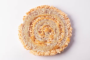 Thai Sweet Crispy Rice Cakes with Cane Sugar Drizzle on white background