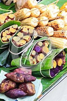Thai Sweet potatoes steamed and wrapped in banana leaf